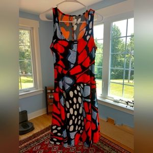 Sleeveless medium butterfly pattern dress.